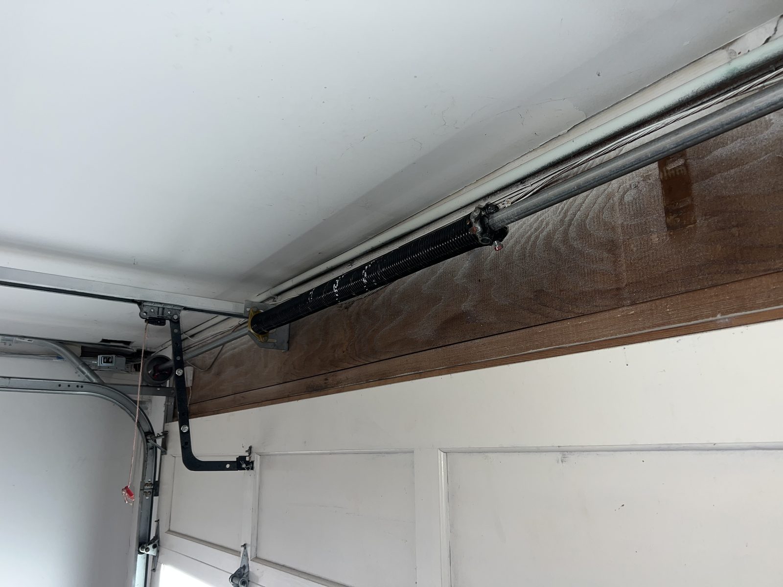 New garage door torsion spring installed on a home in Half Moon Bay, CA