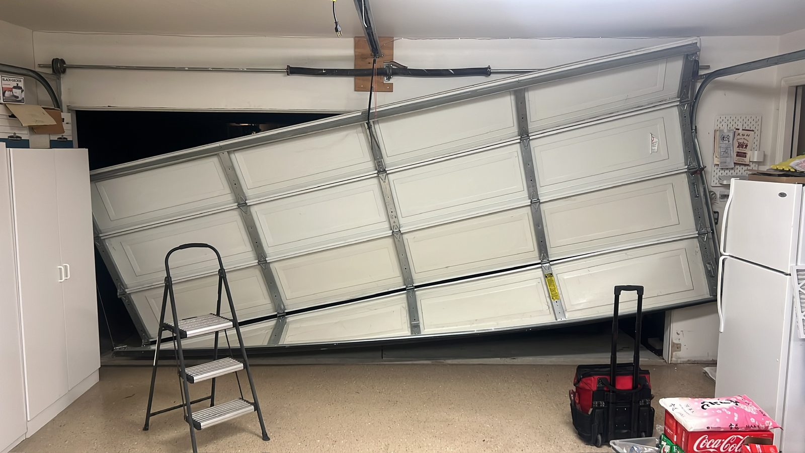 Garage door off-track repair at a Rockaway Beach home in Pacifica