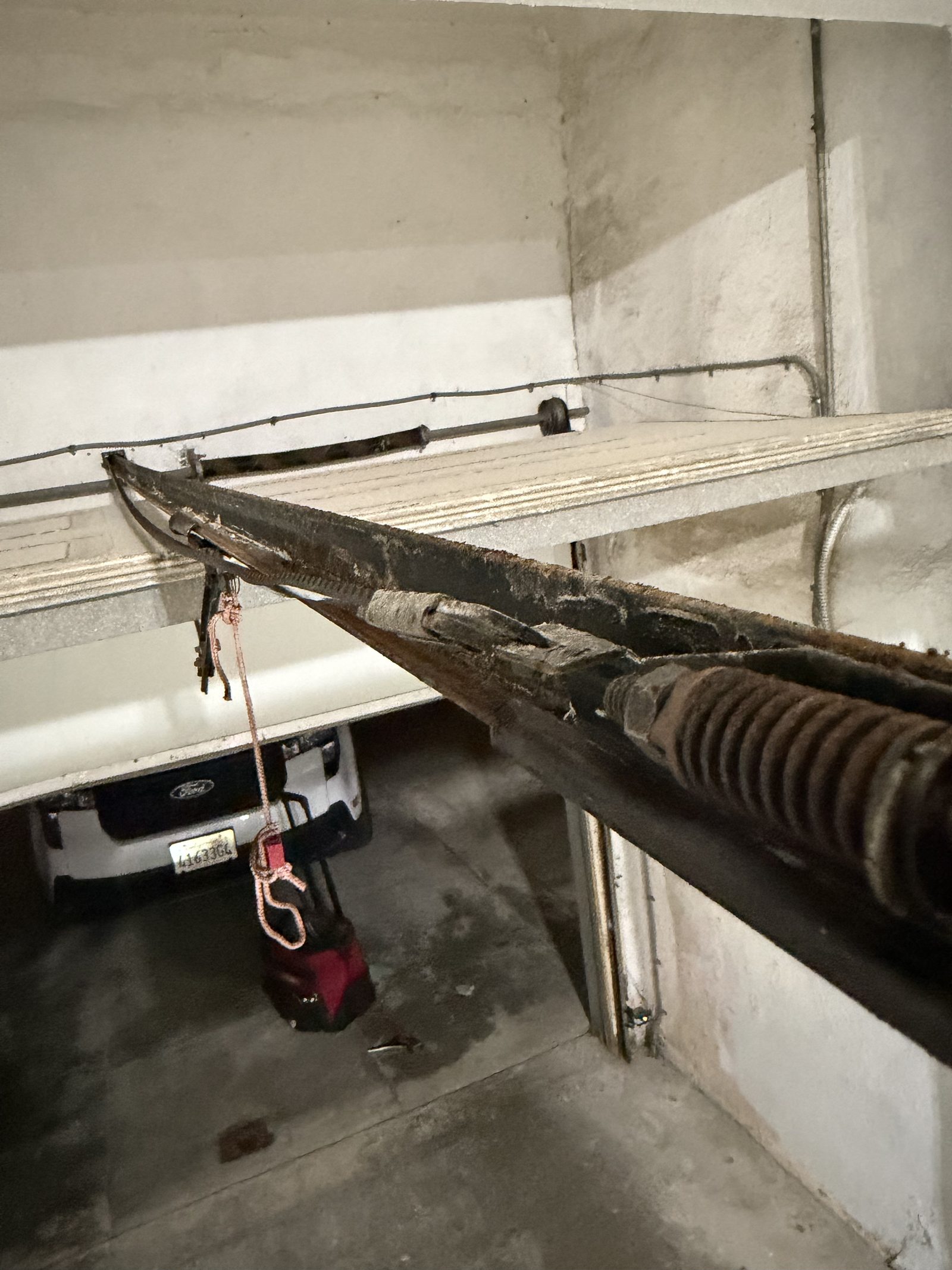 Rusted garage door hardware restored in Pedro Point, Pacifica